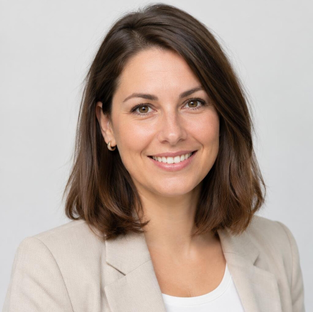 Studio portrait of a Slovenian woman wellness program manager smiling